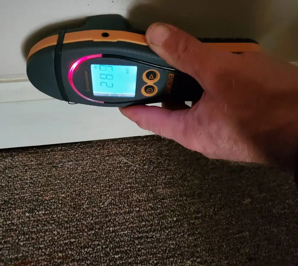 Moisture detection at baseboard during Burst Pipe Cleanup in North Druid Hills